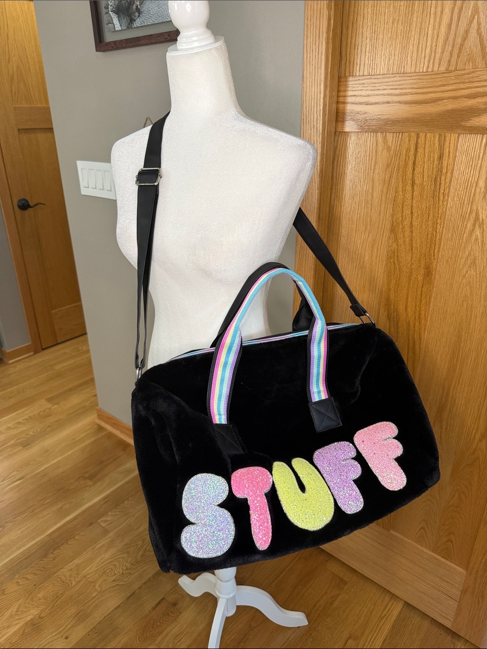 Black Fuzzy Weekender Bag with Rainbow Handles and 'STUFF' Lettering